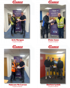 Home 9 Employees receiving service recognition awards.